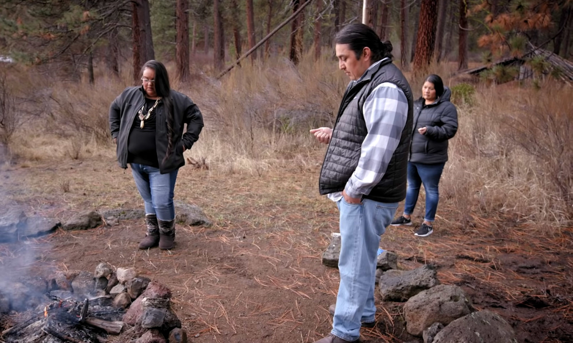 Klamath Tribe members building a fire on their land